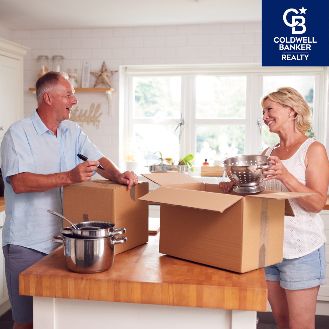 Husband and wife packing up boxes in kitchen Alan Fishman Realtor Franklin County PA